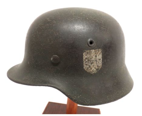 WW2 German Third Reich M1940 Steel Helmet crown with traces of green paint. &nbsp;Left side with ghost of Army decal. &nbsp;L