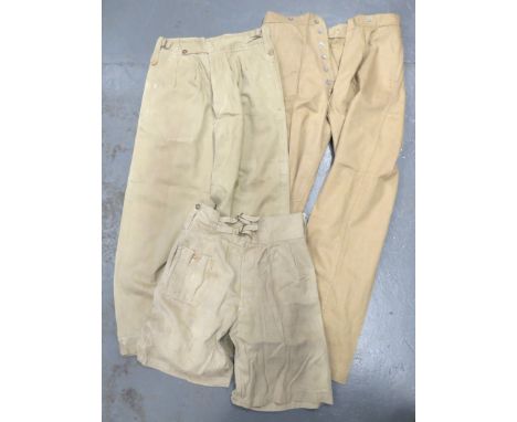 Three WW2 Pattern Khaki Drill Trousers/Shorts consisting pair of khaki drill, Indian made trousers. &nbsp;Side slash pockets.