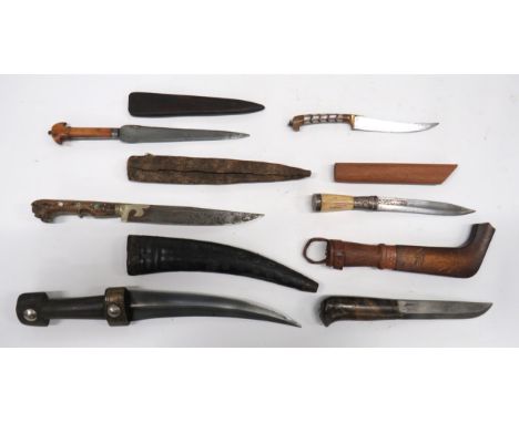 Six Various Eastern And European Knives consisting 8 1/4 inch, double edged, jambiya blade. &nbsp;Horn grip of typical form. 