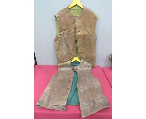 Two WW2 Pattern Leather Jerkins brown leather, sleeveless, single breasted jerkins. &nbsp;Front secured by plain composite bu