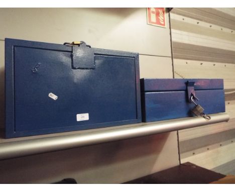 A metal four drawer tool box complete with assorted tools together with another tool box