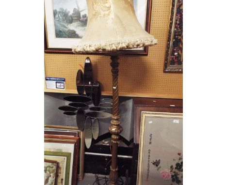A gilt painted painted standard lamp