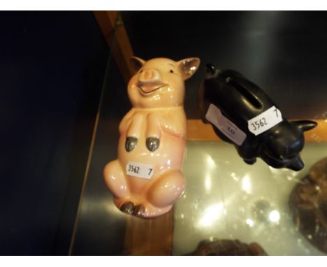 A Goebel wall plaque in the form of a 'Pig', together with another pig money box
