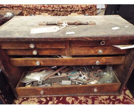 A selection of mainly engineers lather tools and bits etc housed in an oak chest