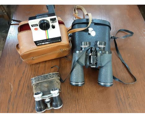 Chinon 10 x 50 wide angle field glasses, Polaroid land camera and a pair of leather cased opera glasses.