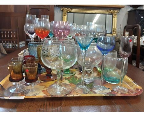 2 trays of coloured drinking glasses to include large stemmed wine glasses, gin glasses, Artland cocktail glasses, etc.