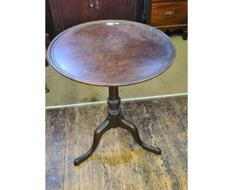 Georgian mahogany circular dish top, tilt top table with turned column tripod base.