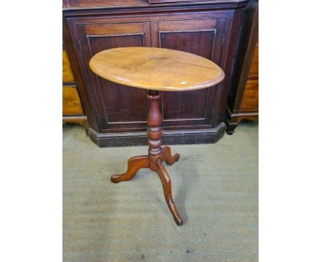 Victorian mahogany oval topped turned column tripod based occasional table.