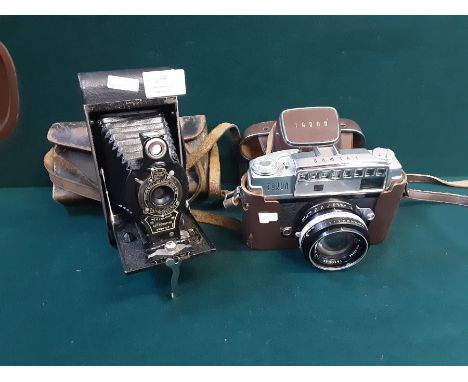 Vintage leather cased Kodak No. 2 folding autographic Brownie and a Taron Eyeman 35mm camera.