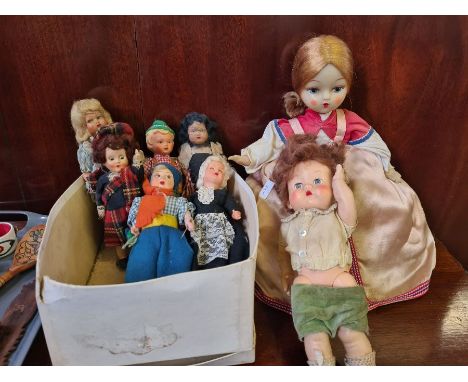 Various celluloid miniature dolls, small pedigree doll, doll tea cosy and a tray of wooden wares to include Dutch clogs, wood