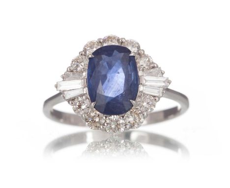 CERTIFICATED SAPPHIRE AND DIAMOND RING set with an oval sapphire of approximately 2.06 carats, within a diamond halo totallin