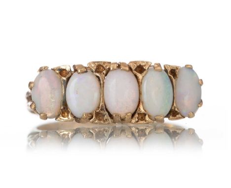 OPAL DRESS RING set with five oval cabochon stones, in nine carat gold, size OQty: 3g