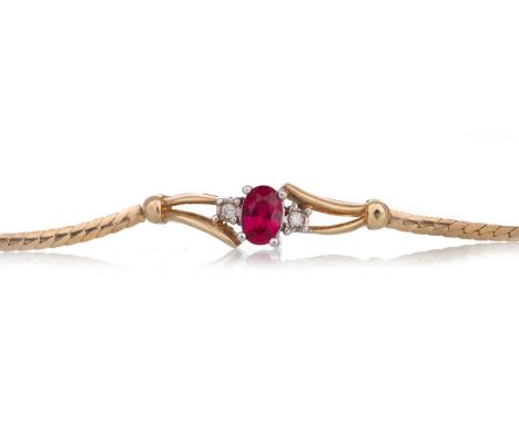 RUBY AND DIAMOND BRACELET  set with central ruby flanked by illusion set diamonds, in nine carat gold  Qty: 3.5g  18cm long. 