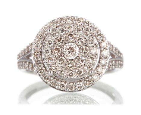 DIAMOND CLUSTER RING set with round brilliant cut diamonds totalling approximately 1.00 carat, in nine carat white gold, size