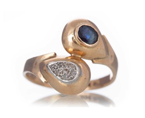 SAPPHIRE AND DIAMOND RING set with an oval sapphire and small cluster of diamonds, marked for fourteen carat gold, size PQty: