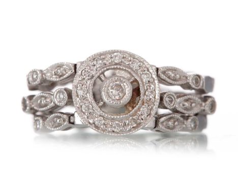 FLEXIBLE DIAMOND RING set with small round brilliant cut diamonds, marked 750, size M 1/2Qty: 6.1gWell worn. Residue on the r