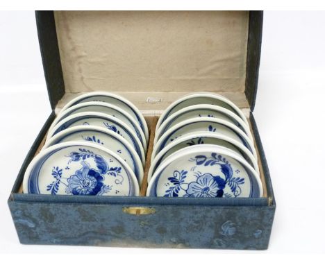 A set of ten Arnhem blue and white delft circular coasters, each 8.5cm diameter, boxed.Condition report:Box a/fMildewed , dam