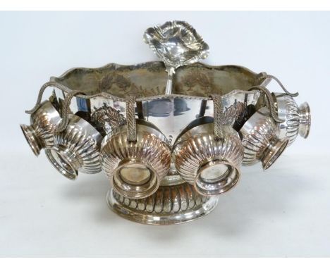 E.P. punch bowl with embossed decoration, with ladle and six cups. 