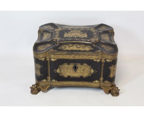 Late 18th century/early 19th century Chinese export black lacquer gilt decorated tea caddy of lobed rectangular form, with mu