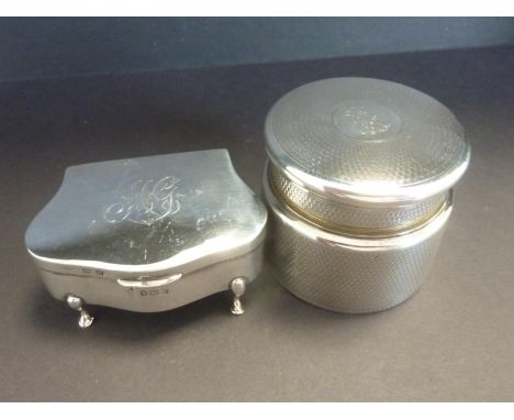 Silver trinket box with waved sides, Birmingham 1913, 7cm and an ointment pot, engine turned, 1928. (2).