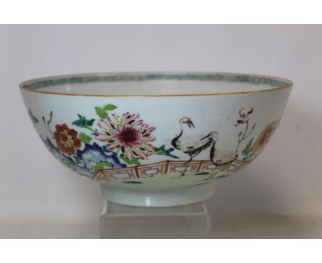 Large late 18th century Chinese famille rose porcelain bowl, the exterior decorated with cranes in a garden with fence and pe