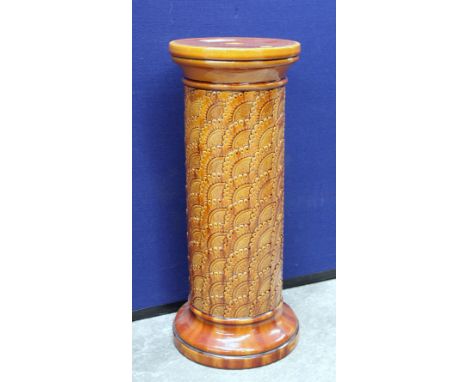 Victorian Arts and Crafts Burmantofts jardiniere stand with moulded scale decoration and ochre glaze. Impressed mark and no. 