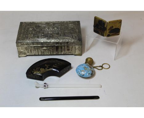 Small late 19th/early 20th Century Japanese tortoiseshell box of curved form with gilt decoration of Mount Fuji, 10.5cm wide.