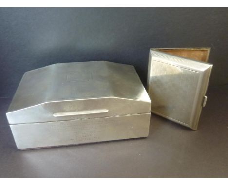 Silver cigarette box inscribed 'The Morecambe Golf Club' ' The C John Clark Cup Winner 1938', Birmingham, 1938, and a silver 