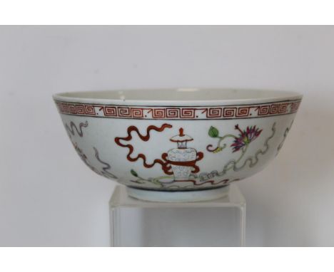 19th century Chinese circular porcelain bowl, the exterior decorated with treasures and ribbons in polychrome enamels, painte