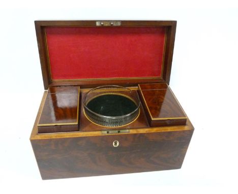 Regency flame mahogany tea caddy of rectangular form with inlaid stringing, small brass loop handle and bone escutcheon, the 
