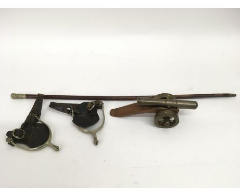 A swagger stick, pair of spurs and model canon - NO RESERVE