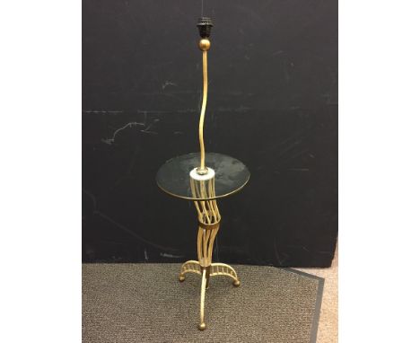 A mid-20th century painted metal standard lamp table, the twisted lamp arm above a circular glass table supported on a series