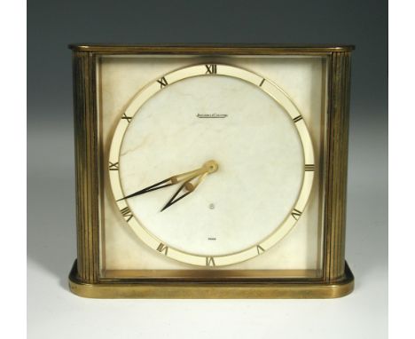 A Jaeger-le-Coultre gilt brass desk clock, the brass dial with Roman numerals to a parchment background, numbered 1589 16.50 