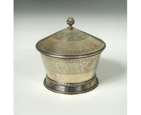 An Art Deco silver presentation cup and cover by H&S, London 1927, with cone and leaf finial decorated with bands of scrolls 
