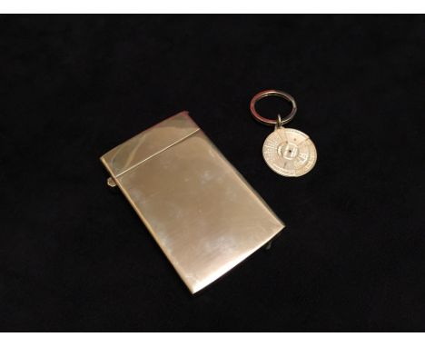A contemporary silver card case and accompanying perpetual calendar keyring by Philip Kydd, London 2000 and 2013, the plain c