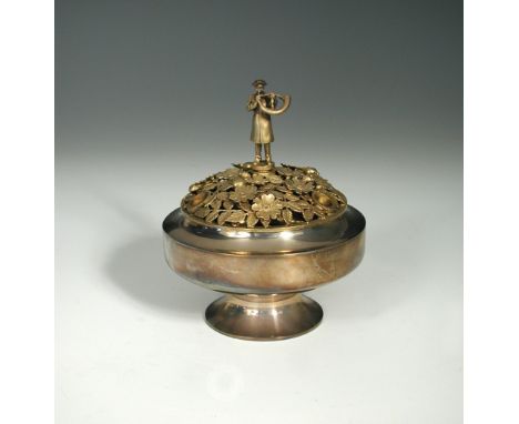 The Ripon Centrepiece, a limited edition silver centrepiece by Hector Miller for Aurum Designs, London, 1986, the pierced fol