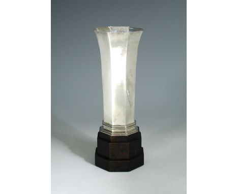 A George V octagonal silver trumpet vase by Omar Ramsden, London, 1927, with multiple moulded base, the underside inscribed O