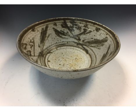 § Helen Pincombe (British, 1908-2004), a large stoneware bowl, with stylised foliate design, ash glaze, impressed seal mark 1