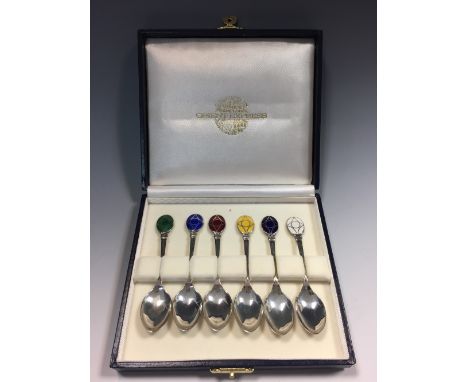 A cased set of six silver and enamel teaspoons for the Venice Simplon Orient Express, London, 1992, each with coloured enamel