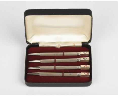 A set of four silver and enamel bridge pencils, marked sterling silver, engine-turned decoration, the finals enamelled with t