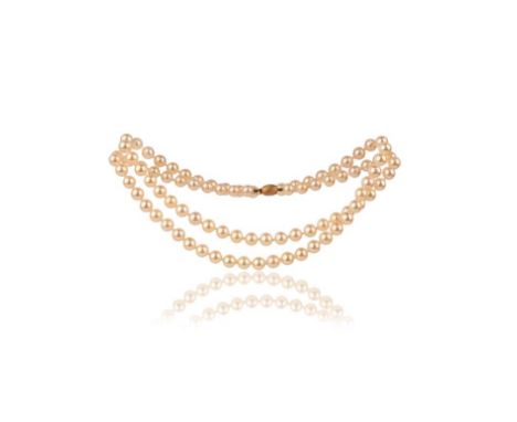 A cultured pearl necklace, the single strand of cultured pearls measuring approximately 7.5mm, to a gold barrel clasp, length
