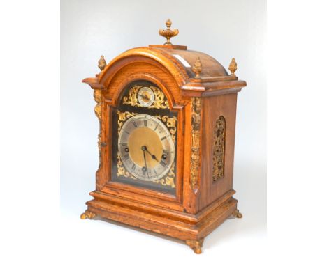Stockuhr mit Carillonschlag auf Tonfeder "RG"Eiche mit vergoldeten Bronzeappliken, versilbertes Zifferblatt und Anzeige, Schl