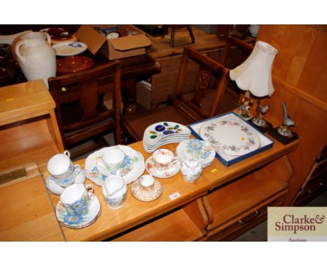 A quantity of various decorative teaware; a Royal Worcester cake serving plate; a decorative table lamp; and a pair of Italia