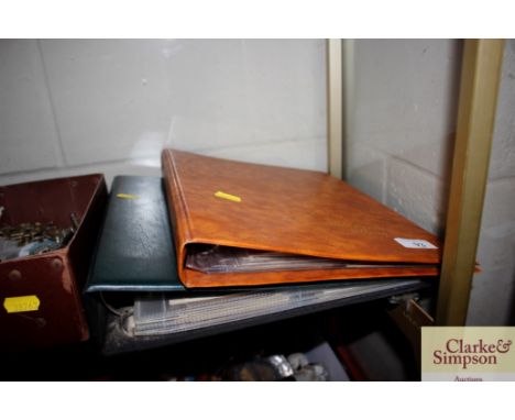 A post-card album containing ships; and another of vintage greeting cards 