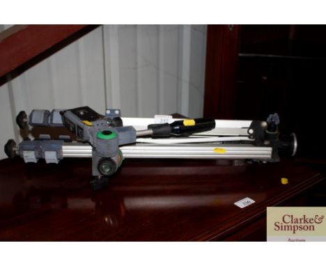 A Slik 88 camera tripod