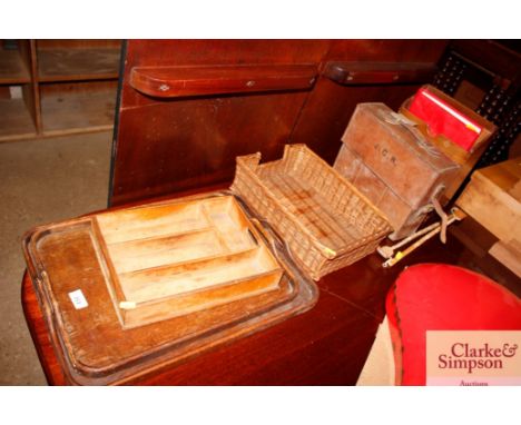 A vintage leather case; an oak stationery rack; a wicker basket; trays etc. 