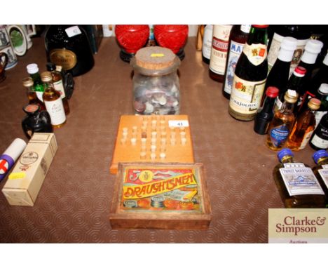 A set of draughts in original box; a Solitaire set; and a jar of vintage buttons