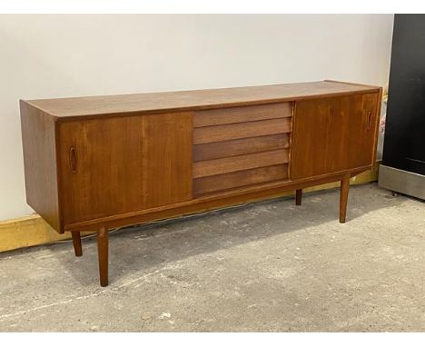 Nils Jonsson for Troeds, a mid-century teak sideboard, the rectangular top over five drawers and two sliding cupboard doors, 