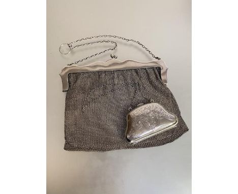 A large George V silver mesh evening purse, S. Blanckensee Ltd, Birmingham 1914, kid-lined; together with an Edwardian silver