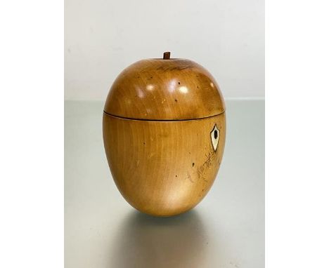 A fruitwood tea caddy in 18th century style, modelled as an apple, with hinged cover and key. Height 13.5cm